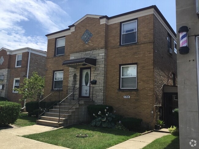 Building Photo - 7705 W Fullerton Ave Unit 2E Rental