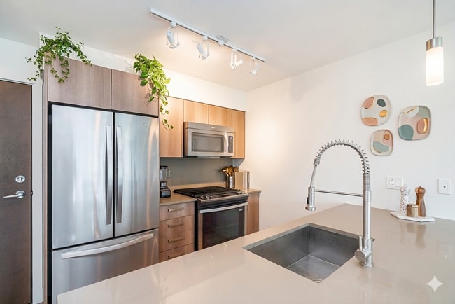 Building Photo - 7058 14th Ave