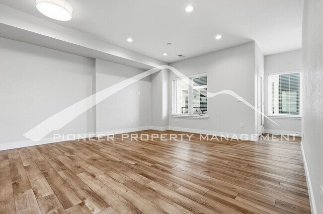 Photo - Spacious Townhouse with Central AC and 2-Car Garage
