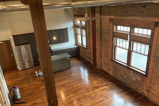 brick, beams and natural light - 65 Vandalia St Apartment Unit 23