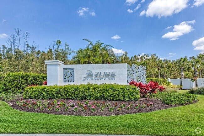 Building Photo - 2/2+Den Coach Home Available Annually! Unit 8886 St Lucia Dr.#101