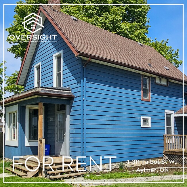 Building Photo - 3-Bedroom with a Fenced Yard! Unit 1