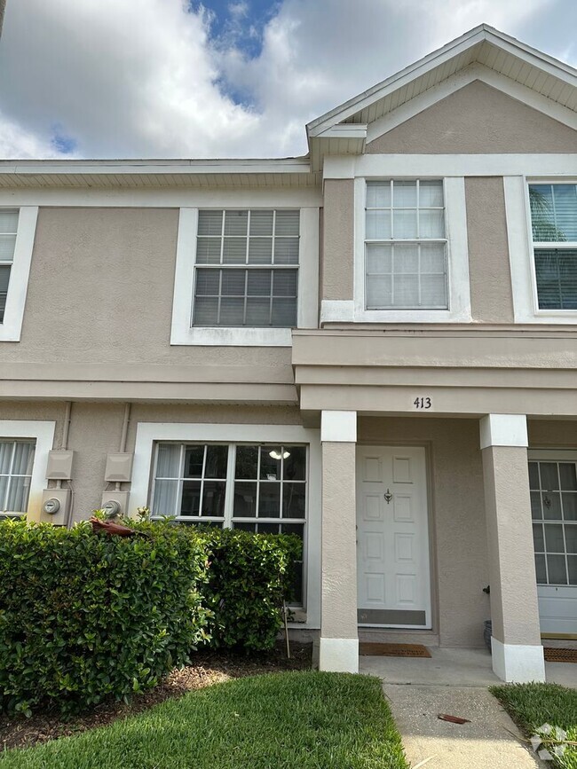 Building Photo - Beautiful Townhome in a gated community wi...