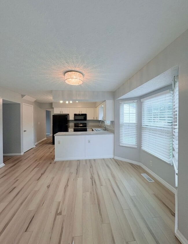 Photo - 4BR/2.5BA | Newly Flooring | Garage | Gated back yard