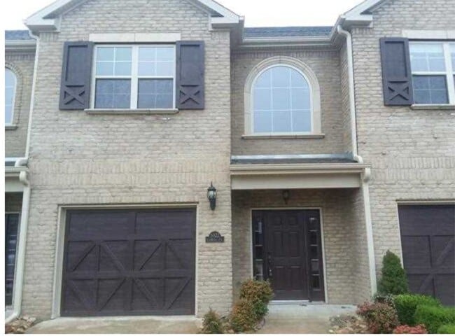 Building Photo - 5322 La Belle Town House