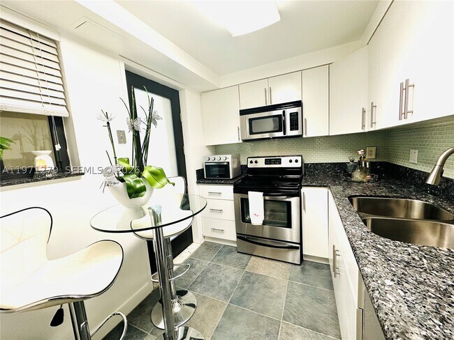 Photo - 301 Golden Isles Dr Unit 114