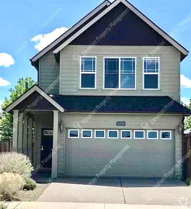 Building Photo - 3  BR home with new flooring in a great NE...