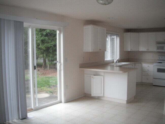 Photo - Spacious home and yard ready for you!