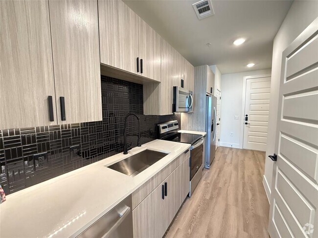 Building Photo - 2520 Washington Ave Unit 636 Rental