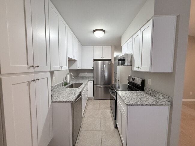 Photo - Charming 2-Bed, 2-Bath Condo with Granite Finishes Ready for Move In.