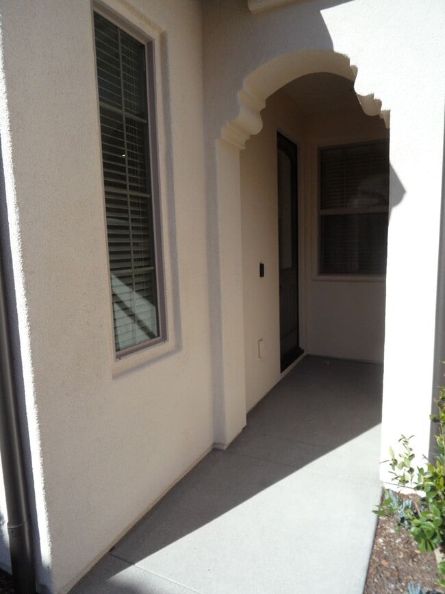 Photo - 4BR 3BA two-story condo with 2 Car Attache...