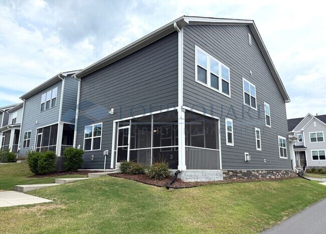 Photo - Spacious Corner-Lot Home with Guest Suite, Screened Porch & Detached 2-Car Garage – Resort-Style ...