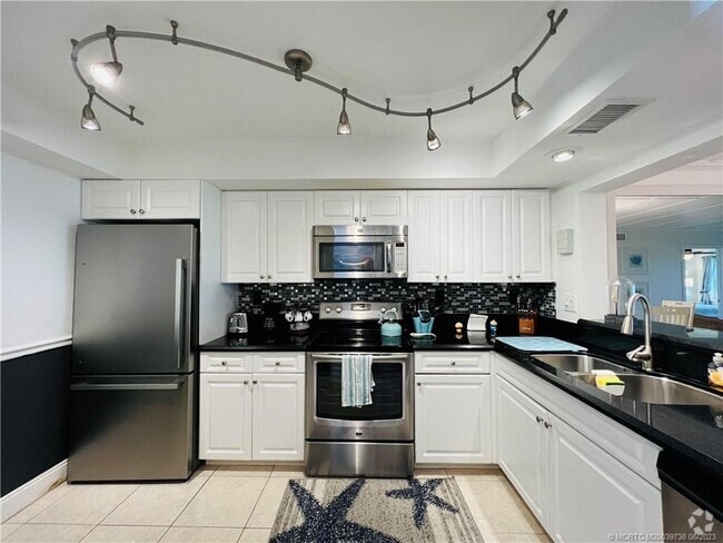 Building Photo - 9490 S Ocean Dr Unit 213 Rental