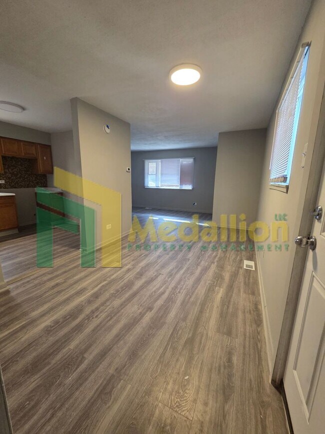 Photo - Updated 5-Bedroom Home with Finished Basement and Fenced Yard