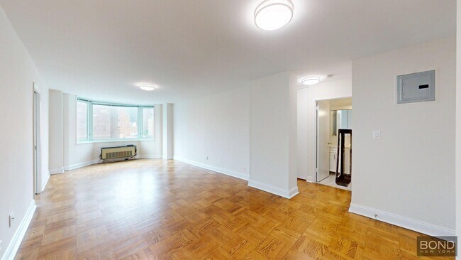 Building Photo - 400 E 71st St Unit 12E Rental