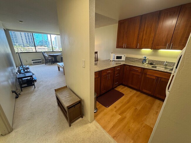 Photo - Available Now! Furnished Downtown 1 Bed/ 1 Bath Condo with A/C & Pool at Kukui Plaza Unit E909