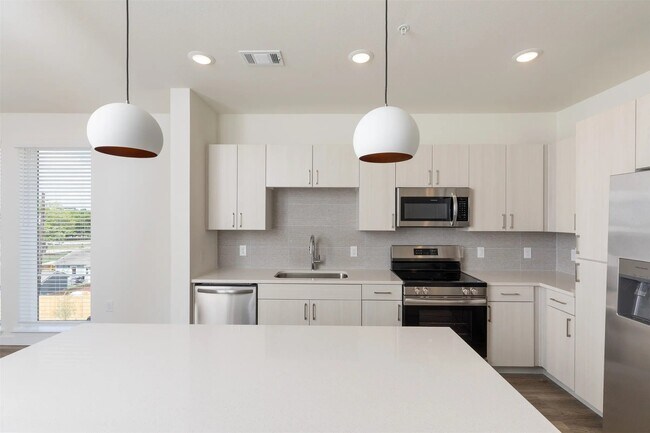 Building Photo - 1690 North Loop Unit 312