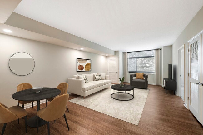Updated Finishes living and dining area with hard surface flooring