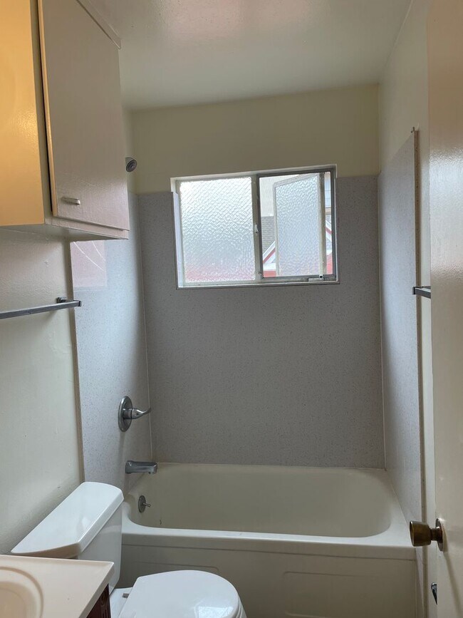 Photo - Updated Kitchen & Bathroom with New Flooring - Top Floor Unit with Fresh Paint Unit 09