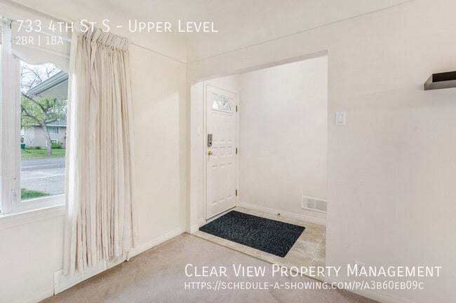 Photo - ?? Charming 2-Bedroom Upper Level Suite with Garage and Utilities Included!!