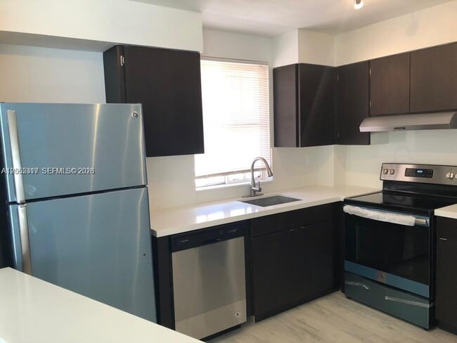 Building Photo - 6195 NW 186th St Unit 403