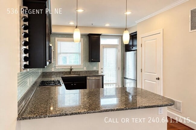 Photo - 536 Regent Pl NE