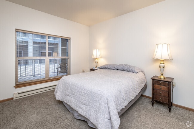 2BR, 1BA - 1,200SF - Primary Bedroom - The Estates at Moorhead - All Inclusive 55+