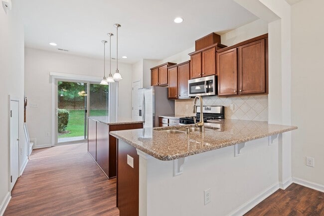 Photo - 2 Bedroom, 2.5 Bath townhome in Thompson Ridge with new LVP flooring downstairs.