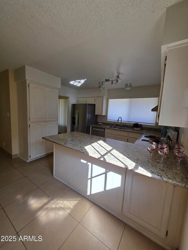 Photo - 10470 E Clinton St