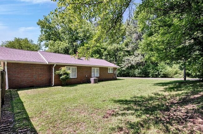 Photo - 4 bedroom 2 Bath - Available Now on Main A...