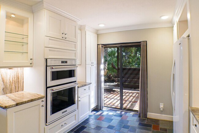 Photo - RARE ON MARKET , 2+den 2 1/2 bath overviewing a lake behind bell tower