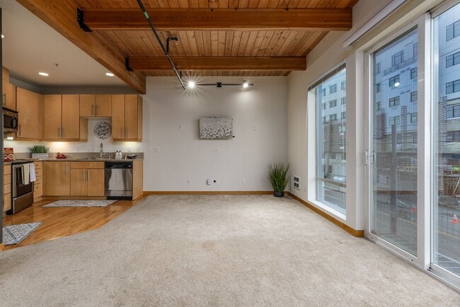 Building Photo - Downtown townhome featuring attached garage!