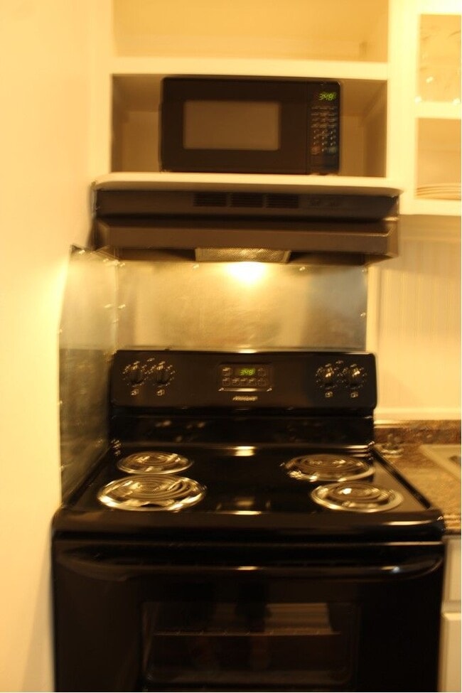 The kitchen also has a full size electric range and microwave. - 3813 Gallatin Pike Unit 41