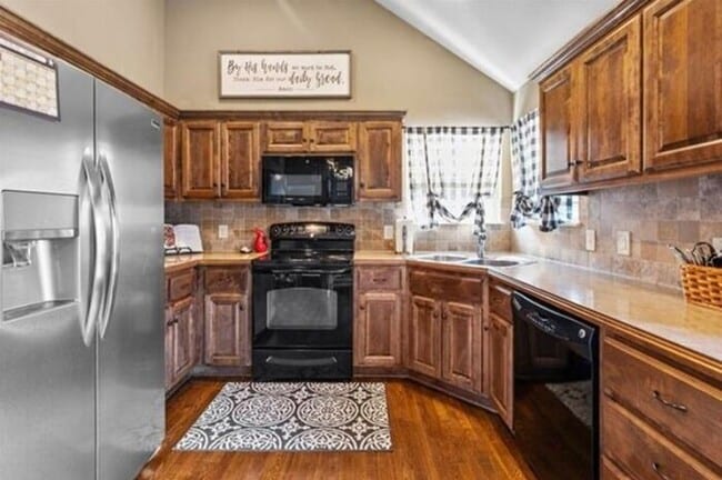 Photo - Stunning 3BR 2.5BA Home w/ Fenced Yard & Spacious Deck • Stainless Kitchen • Oversized Garage in ...