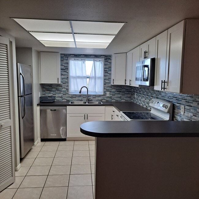 Photo - 12300 Park Blvd Unit Oakhurst Condominium 209