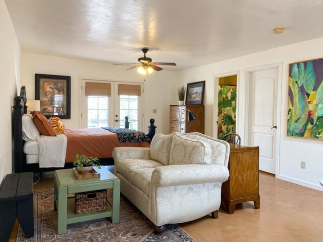 Bed and living area - 2648 E Drachman St Unidad Studio Casita - furnished AND utilities