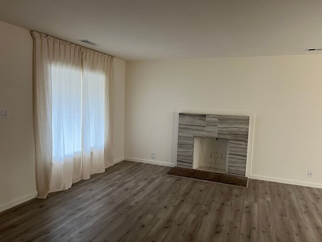 Photo - STUNNING 2bd/1ba WITH PRIVATE BACK YARD, AIR CONDITIONING, LVP FLOORS, MODERN KITCHEN, AND MORE!!!!