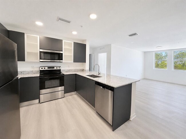 Building Photo - 5587 Millennia Park Dr Unit 316