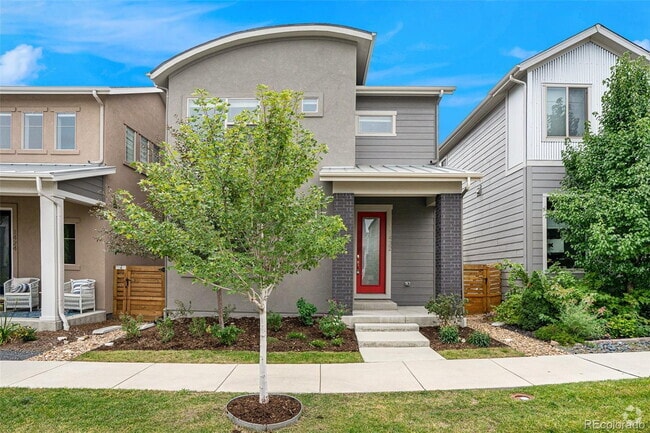 Building Photo - "Spacious 4-Bedroom Sanctuary with 3.5 Bat... Rental