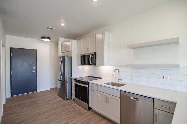 Earl Studio 481 sq ft SB Studio Kitchen - The Earl Apartments and Twin Homes