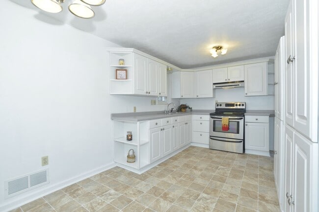 Kitchen with Stove and fridge - 135 Elmont St