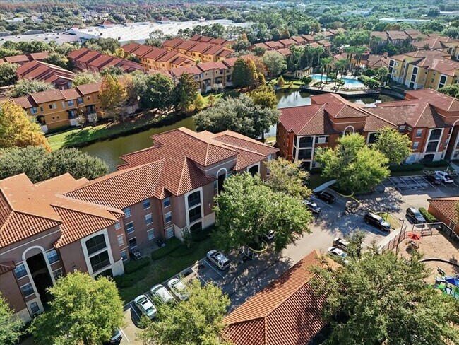 Building Photo - 6141 Metrowest Blvd Unit 207