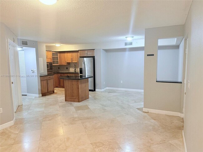 Building Photo - 11177 SW 8th St Unit 105