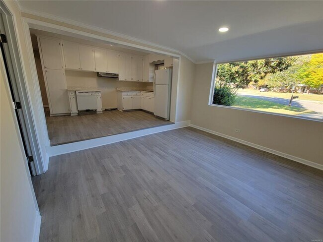Photo - NEW Floors, Roof, Lights, Appliances, ect. NO CARPET