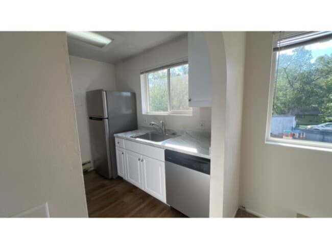 Photo - Tired of outdated rentals? This stunning two bedroom upper level duplex unit boasts a complete moder