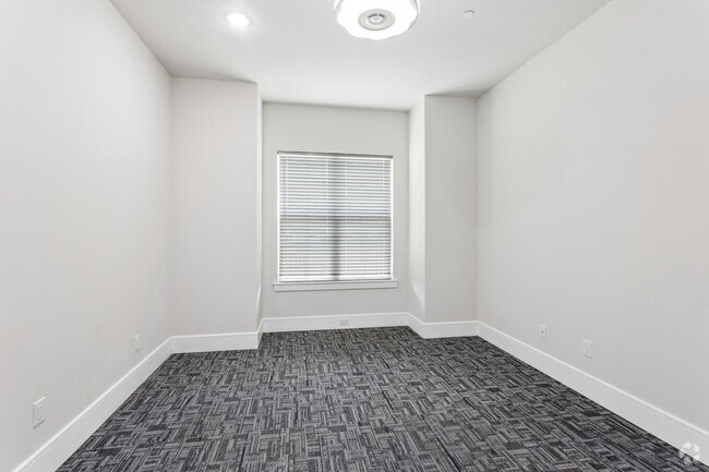 2BR, 2BA - 1,140SF - Primary Bedroom