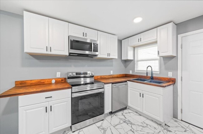 Photo - Move-In Special: $300 Off First Month if You Move on or before Feb 28, 2026!