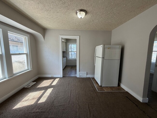 Photo - Charming 2-Bedroom Home with Secure Front Porch, Carport & Big Yard in Goodyear Heights