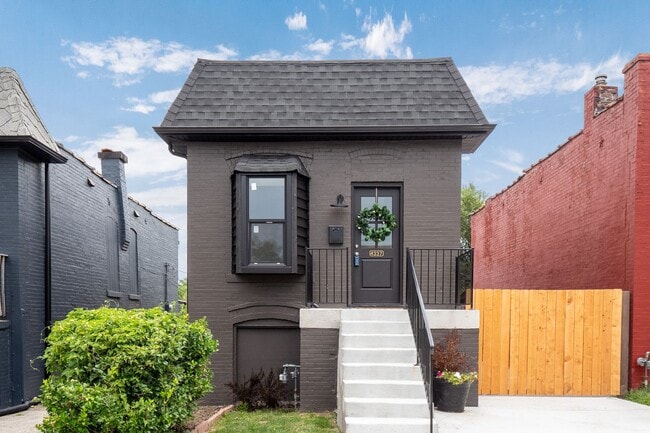 Building Photo - $1795 - Single Family Home with Private Two-Level Living Spaces, Driveway Parking & Modern Updates