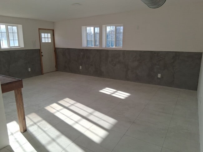 Photo - Large duplex with 3 car garage and made for blue collar folks.